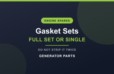 Diesel engine gasket set laid out with cylinder head gasket and seals